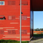 Adalberto Dias's Agra do Casto Residential Complex at the University of Aveiro showcasing a modern design with composite materials and extensive daylighting features.