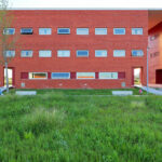 Adalberto Dias's Agra do Casto Residential Complex at the University of Aveiro showcasing urban design elements with a modern lawn and campus setting.