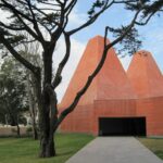 Eduardo Souto de Moura's House of Stories Paula Rego showcasing a triangular structure with a modern design.
