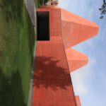 Eduardo Souto de Moura's House of Stories Paula Rego showcasing a symmetrical triangular structure with a modern design.