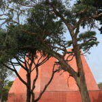 Eduardo Souto de Moura's House of Stories Paula Rego showcasing a modern design with a landscaped exterior and distinctive geometric forms.