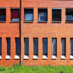 José Carlos Loreiro's Department of Biology I at the University of Aveiro showcasing red brickwork with symmetrical design and ample daylighting.