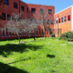 José Carlos Loreiro's Department of Biology I at the University of Aveiro showcasing a modern academic institution with a shaded courtyard, expansive lawn, and public space elements.
