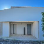 Manuel Graça Dias and Egas José Vieira's 13 Round Houses at Bom Sucesso Resort showcasing a modern design with composite material, concrete structures, and daylighting features.