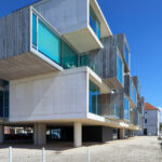 RVdM Arquitectos' ORIZZONT Residential Building showcasing a modern design with prominent balconies and extensive daylighting features.