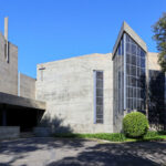Agostinho Ricca’s Igreja do Foco / Igreja de Nossa Senhora da Boavista showcasing brutalist architecture with a concrete façade and bold geometric forms characteristic of corporate headquarters design.