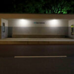 Álvaro Siza Vieira’s Abrigos da Linha de Metro-Bus “Boavista-Império” showcasing minimalist concrete shelters illuminated at night within a subway environment.