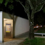 Álvaro Siza Vieira’s Abrigos da Linha de Metro-Bus “Boavista-Império” showcasing concrete composite material bus stops with shaded walkways and adjacent sidewalks in a public space.