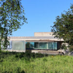 André and António Fontes’ Projecto Homem showcasing a modern wetland structure with integrated natural elements and sustainable design features.
