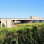 André and António Fontes’ Projecto Homem showcasing a modern concrete structure with bold geometric forms and exposed raw concrete surfaces.