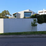 Eduardo Souto de Moura’s Casa do Cinema Manoel de Oliveira showcasing a concrete structure with strategic shading and natural daylighting elements.