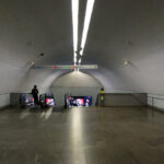 Eduardo Souto de Moura’s Metro do Porto station showcasing a minimalist concrete structure with clean lines and integrated subway elements.