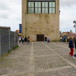 Fernando Távora’s Torre da Sé (Casa dos 24) showcasing a robust concrete structure with visible walking paths around the building.