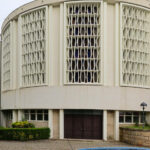Paulo Sampaio’s Igreja Paroquial da Senhora da Hora showcasing symmetrical architectural design with clean lines and a prominent façade.