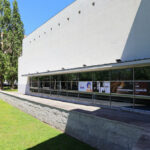 Pedro Ramalho and Luis Ramalho’s Casa das Artes showcasing a brutalist concrete structure with composite materials, extensive daylighting, shaded public spaces, and a distinctive corporate headquarters design.