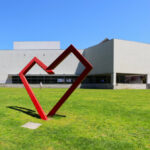 Casa das Artes by Pedro and Luis Ramalho showcasing a modern public space with shaded areas, landscaped surroundings, and campus-style open design.