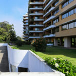 Unknown Architect’s Apartment Building Rua de João Paulo Freire showcasing a high-rise residential structure with a modern façade, multiple balconies, and urban design elements in a metropolitan cityscape during daytime.