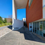 Unknown Architect’s Complexo Pedagógico III at Universidade do Minho showcasing a concrete structure with composite materials, engineered shading elements, and daylighting features.