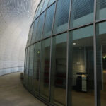 Unknown Architect’s Serviços de Ação Social at Universidade do Minho showcasing a modern design with extensive glass façades, steel structural elements, and emphasis on daylighting and transparency.