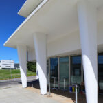 Unknown Architect’s Complexo Pedagógico III at Universidade do Minho showcasing brutalist architecture with composite material columns, shaded areas, and strategic daylighting design elements.