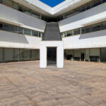 Unknown Architect’s Escola de Economia e Gestão at Universidade do Minho showcasing a composite material façade with extensive daylighting features.