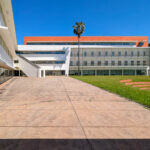 Unknown Architect’s Escola de Economia e Gestão at Universidade do Minho showcasing a composite material façade with integrated shading elements and extensive daylighting on a modern campus headquarters.
