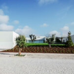Nuno Graça Moura’s 8 Villas at Bom Sucesso Resort showcasing modern composite material construction with landscaped gardens, concrete driveways, and shaded outdoor spaces.