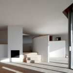 Atelier dos Remédios, Madalena Cardoso de Menezes, and Francisco Teixeira Bastos’ 6 Casa X Villas at Bom Sucesso Resort showcasing modern villas with composite material floors, concrete structural elements, and wood-stained finishes.