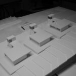 Josep Llinás’s House Model 2 showcasing a detailed scale model with composite materials, architectural plans, and design elements visible.