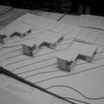 Josep Llinás’s House Model 2 showcasing a detailed 3D scale model with architectural plans and design elements visible.