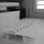 Josep Llinás’s House Model 2 showcasing a modern design with clean lines, large glass windows, and a minimalist structure emphasizing open space and natural light.