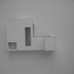 Josep Llinás’s House Model 2 showcasing a minimalist white and grey exterior with clean lines and a modern still life composition.