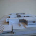 Josep Llinás’s House Model 3 showcasing a scale model with composite material construction, detailed architectural plans, and a prominent staircase design.
