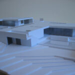Josep Llinás’s House Model 3 showcasing a brutalist architectural scale model with composite materials, featuring angular forms and daylighting elements in an urban design context.