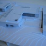 Josep Llinás’s House Model 3 showcasing a detailed scale model with composite materials, highlighting innovative engineering, architectural plans, and daylighting design features.