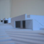 Josep Llinás’s House Model 3 showcasing a modern composite material exterior with clean lines and minimalist architectural design.