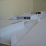 Josep Llinás’s House Model 3 scale model showcasing a transparent design with detailed architectural plans and structural elements emphasizing modern minimalism.