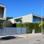 Eduardo Souto de Moura’s Architectural Villa 7 showcasing a minimalist design with clean lines, concrete walls, and large rectangular windows.