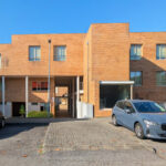 Quinta da Barca Marina Building , Esposende by João Alvaro Rocha (3731) João Alvaro Rocha’s Quinta da Barca Marina Building showcasing a modern residential apartment complex with a sleek glass façade, integrated automotive parking lights, and multiple car types including family, subcompact, mid-size, full-size, compact, and city cars visible in the parking area.