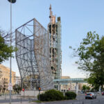 Porta Mar, Lisboa by Manuel Graça Dias, Egas José Vieira (3689) Manuel Graça Dias and Egas José Vieira’s Porta Mar featuring a high-rise iron tower with electrical supply poles and scaffolding, highlighting urban design and engineering elements.