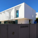 Unknown Architect’s Utopia Villa 11 showcasing a modern villa with concrete construction, composite materials, large balconies, and extensive daylighting features.