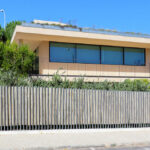 Unknown Architect’s Utopia Villa 9 showcasing a modern villa with shaded balconies and sleek architectural lines.