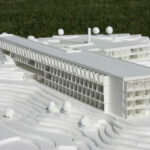 Eduardo Souto de Moura’s Unfinished "Hilton" Hotel, Lot 159, showcasing brutalist architecture with exposed concrete structures, large daylighting openings, and a raw, engineered headquarters design.