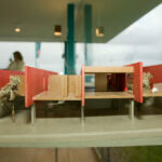 Gonçalo Byrne’s "6 Unbuilt Villas, Lot 209" showcasing a modern design with natural wood stain finishes, composite materials, transparent plywood panels, and a focus on interior hardwood elements with varnish.