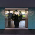 Alcino Soutinho’s Conjunto Habitacional Palácio da Enseada showcasing a modern residential complex with concrete and glass façades, tiled flooring, and extensive daylighting features.