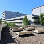 Alcino Soutinho’s Conjunto Residencial Varandas de Venezuela showcasing a high-rise residential building with multiple balconies, glass façades, and integrated public green spaces in an urban condominium setting.