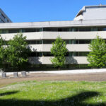 Alcino Soutinho’s Conjunto Residencial Varandas de Venezuela showcasing a high-rise concrete apartment complex with composite materials and urban design elements under daytime lighting.