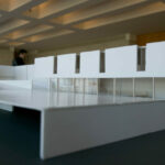 Gonçalo Byrne’s "6 Unbuilt Villas, Lot 209" scale model showcasing composite material flooring, transparent plastic elements, and plywood structural components.