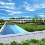 Inês Lobo’s 18 Architectural Townhouses, Lot 126, showcasing modern design with shaded outdoor spaces, artificial turf landscaping, and resort-style elements.