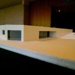 Nuno Graça Moura’s 8 Architectural Villas, Lot 80, showcasing a scale model with composite materials, concrete elements, plywood detailing, and design features emphasizing daylighting.